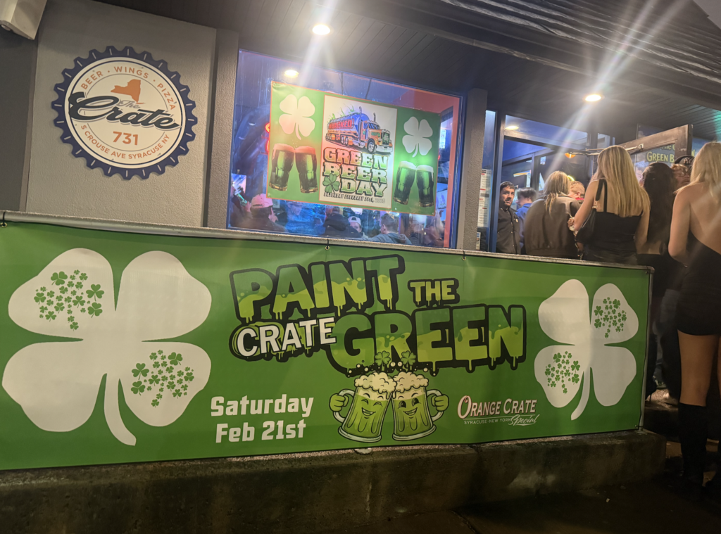 Front of Orange Crate as people line up for 